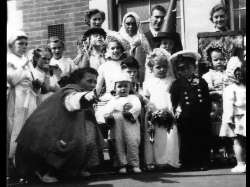 The fancy dress parade at the 1953 coronation street party in Methuen Road, Southsea