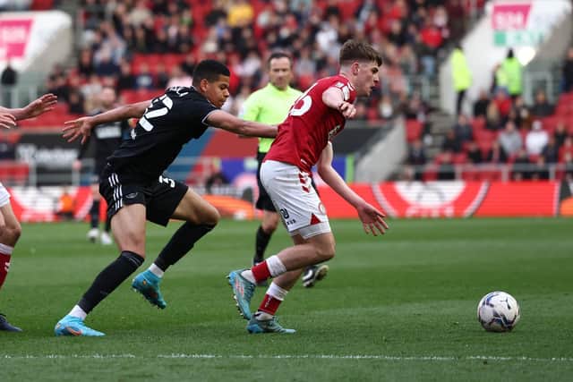 Will Osula of Sheffield United tackles Alex Scott of Bristol City: Darren Staples / Sportimage
