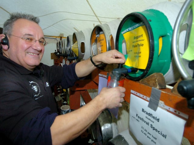 Pulling a pint, Chris Pearce at the 34th Steel City Beer Festival at Cemetery Park, October 2, 2008