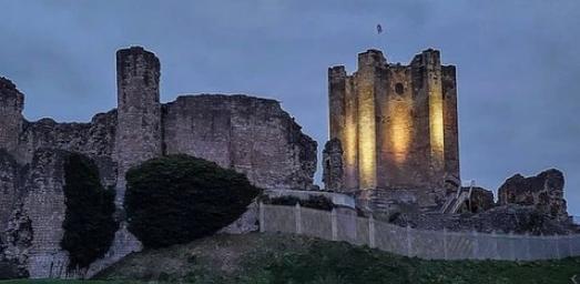 The mighty Conisbrough Castle lit up at night. From  @stevepennock99