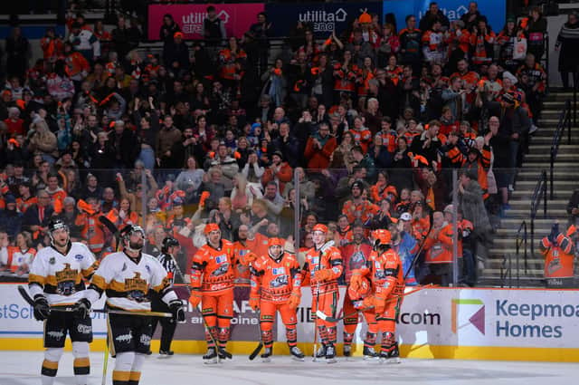 Steelers fans celebrate the second period equaliser over Nottingham Panthers. Picture: Dean Woolley