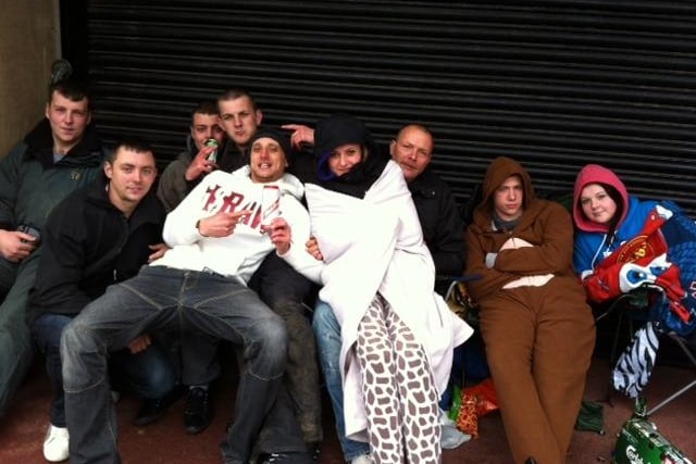 Beers and onesies for these Sheffield United fans queuing for tickets at Bramall Lane ahead of the Play-off Final at Wembley - May 2012