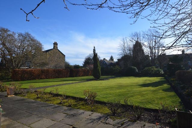 There are extensive gardens to the front and rear of this large corner plot.