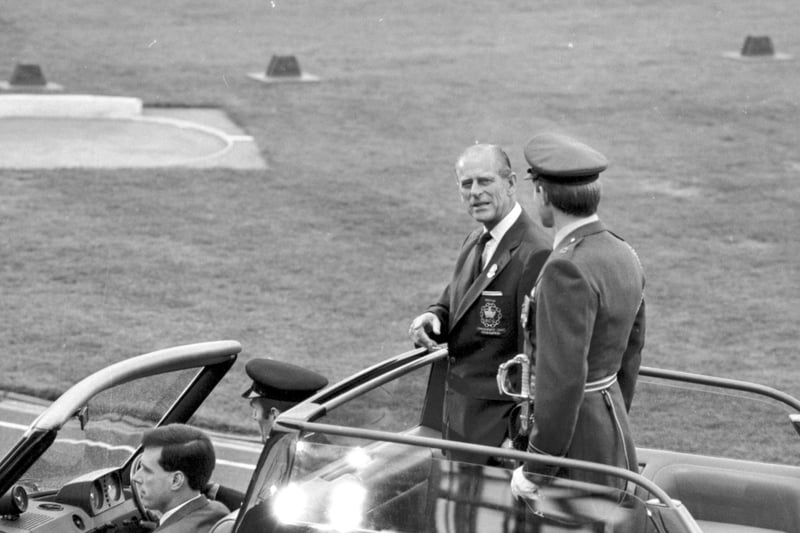 Prince Philip Duke of Edinburgh is driven round the track at  the opening ceremony of the Edinburgh Commonwealth Games 1986, held at Meadowbank stadium.