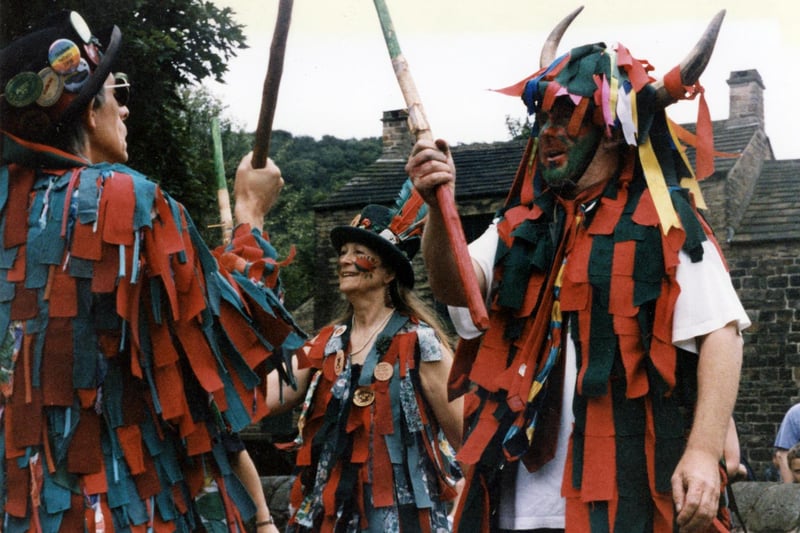 South Riding Folk Network team Wicked Stix Border Morris dancers performing at Abbeydale Industrial Hamlet in the early 90s. Ref no: t09726