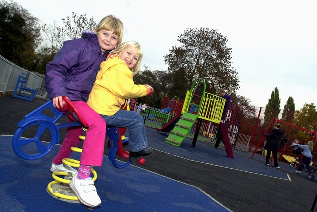 Sisters Leah and Grace Williams, aged seven, and four, had fun at the new children's play area in Tickhill in 2003