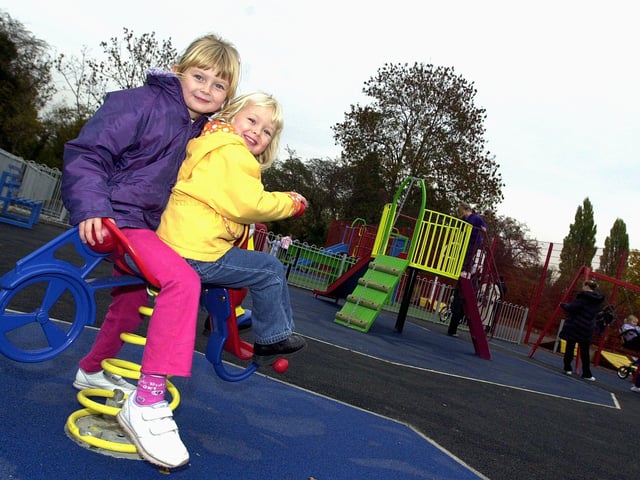 Sisters Leah and Grace Williams, aged seven, and four, had fun at the new children's play area in Tickhill in 2003