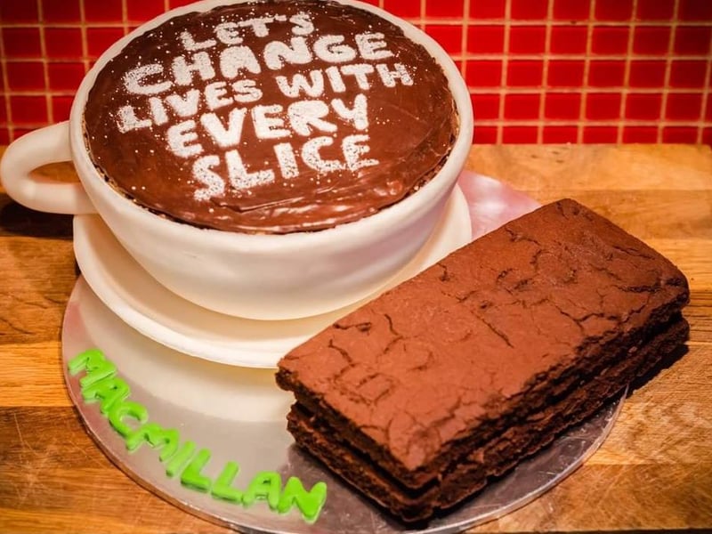 Billy Bridgen, said: "Coffee cake and giant bourbon for Macmillan Coffee Morning."