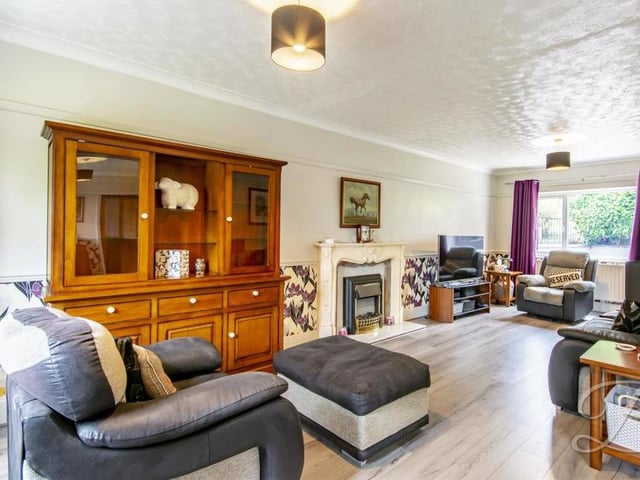 Another view of the living room. With its open layout and abundance of space, it is ideal for entertaining guests.