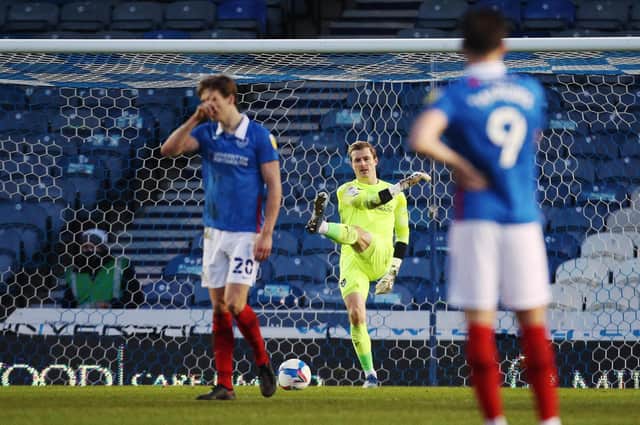 Pompey keeper Craig MacGillivray looks dejected after Hull score their fourth goal