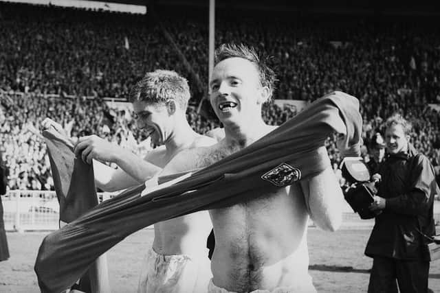 Teammates Alan Ball, left, and Nobby Stiles celebrate after England's victory in the 1966 World Cup final at Wembley, 30th July 1966. (Photo by Evening Standard/Hulton Archive/Getty Images)