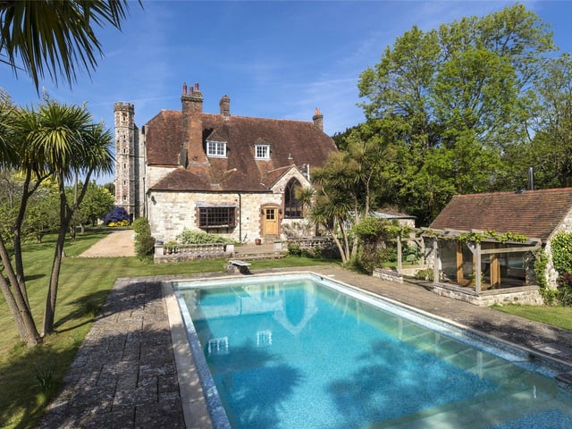 The second floor with its vaulted ceilings and particularly large rooms could lend itself to creating an apartment for guests or extended family members if required.
