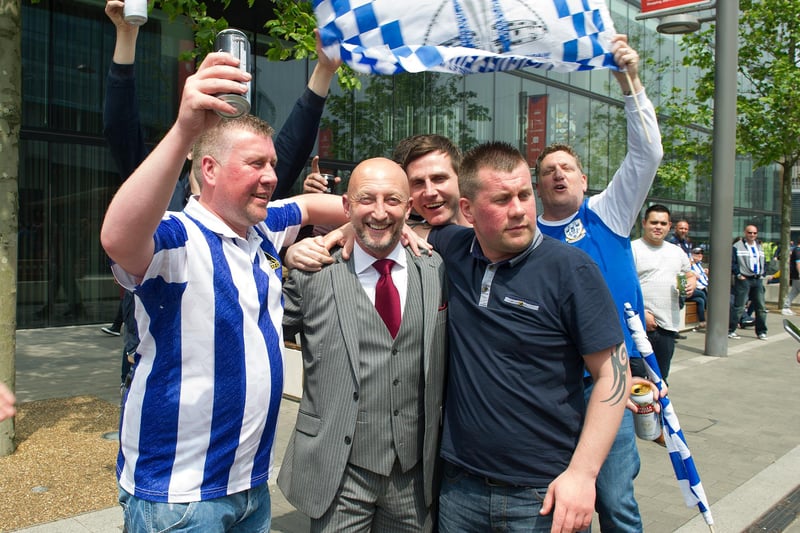 Wednesday fans have their picture taken with pundit Ian Holloway before the match