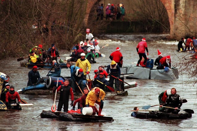 Which faces can you spot taking part in the 1997 Boxing day charity raft race from Matlock to Cromford Meadows on the River Derwent