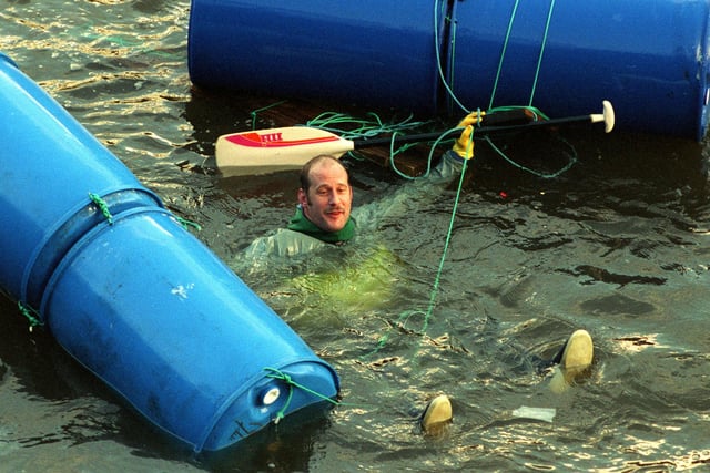 One competitor floating down the river with his raft in 1999