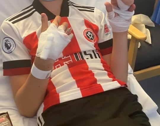 Dad John Turner says Stanley flies the flag for Sheffield United F.C. every day and is always in his Blades kit.