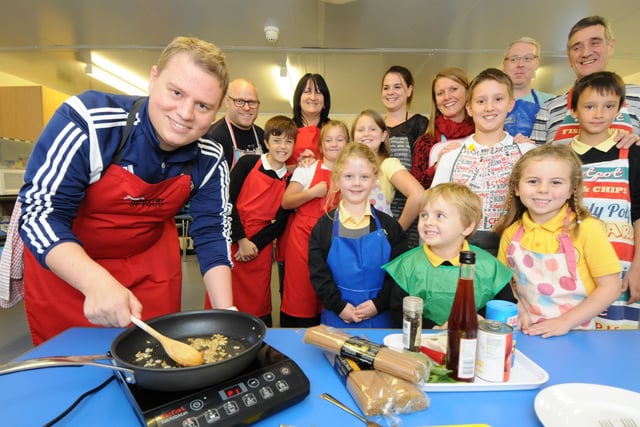 Pupils and parents from Bede Burn Primary School, Jarrow, work with Sunderland AFC Foundation of Light's John Newton, left, during a ten week healthy eating course. Were you there for the event six years ago?