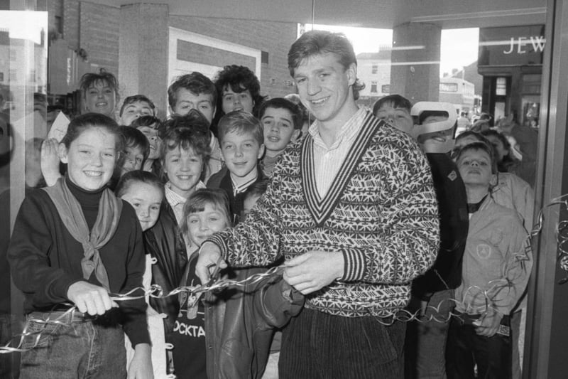 Surrounded by young fans, Sunderland footballer Marco Gabbiadini cut the ribbon to officially open the Lindon House furniture store in Holmeside in 1988.
