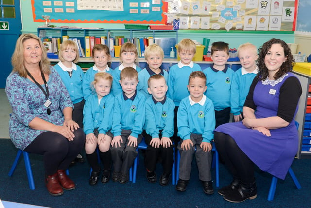 The new reception class pupils at Amble First School in Edwin Street with Barbara Mallaburn and Sharon Donaldson.