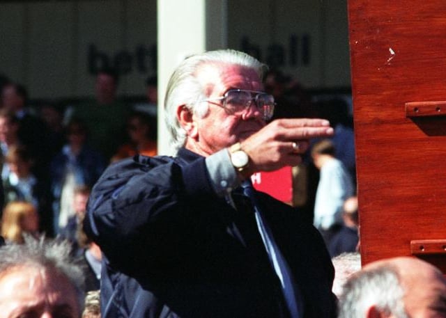 A bookie in action at the 1997 St Leger Day.