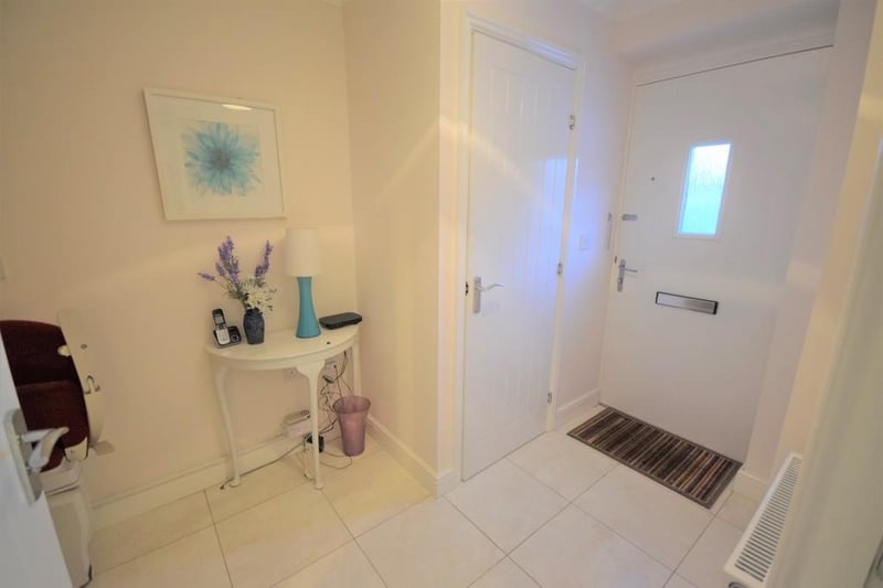 Light and airy entrance & hallway, with internal door to downstairs WC and wash handbasin
