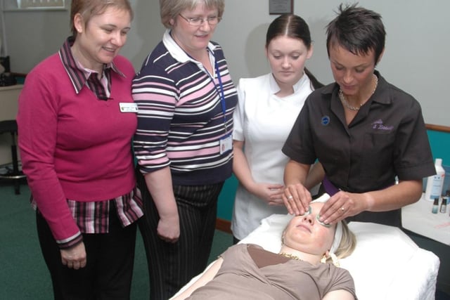 Intake beautician Lindsay Johnson gives Nicola Grundy a relaxing massage, watched by staff nurse Michelle Clark from the Neo-Natal Unit, Janet Stokes and Danielle Meanley, a beauty trainee at Doncaster College in 2006