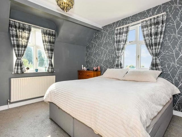 The first bedroom is delightful and a good size. It has uPVC double-glazed windows to the front and side of the farmhouse.