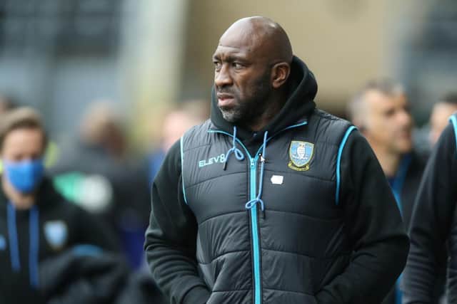 Darren Moore will front a new-look backroom staff at Sheffield Wednesday.