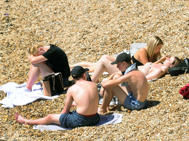 People flocked to the seafront on Thursday, May 21 - the hottest day of the year. Picture: Sarah Standing (210520-2429)