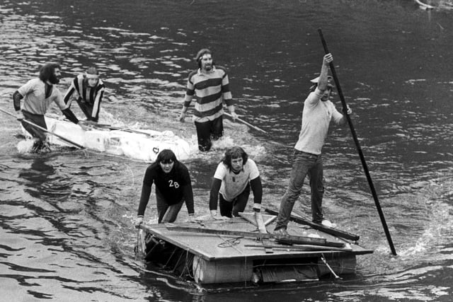 Students take part in a Rag Day river race on October 27, 1973