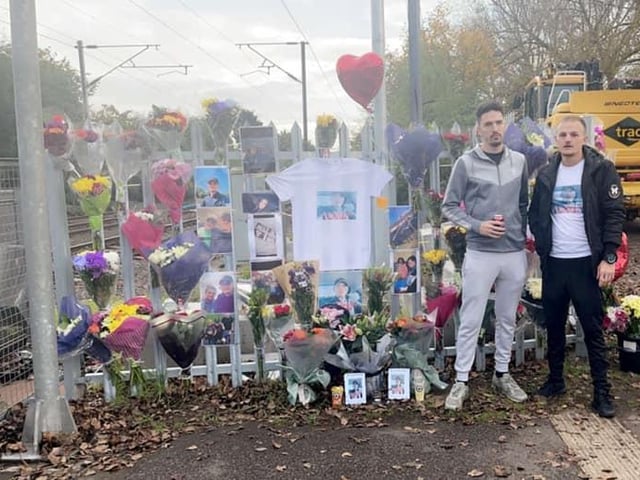 People left flowers, cards and photos. Photo from Jordan Thomas.