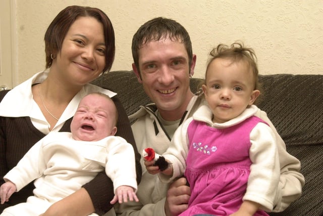 Tracy Wheeler, 30,  and Robert Halsall, 33, of Bramwell Street, Sheffield, with their children, Joshua, 11 weeks, and Tia, 22 months