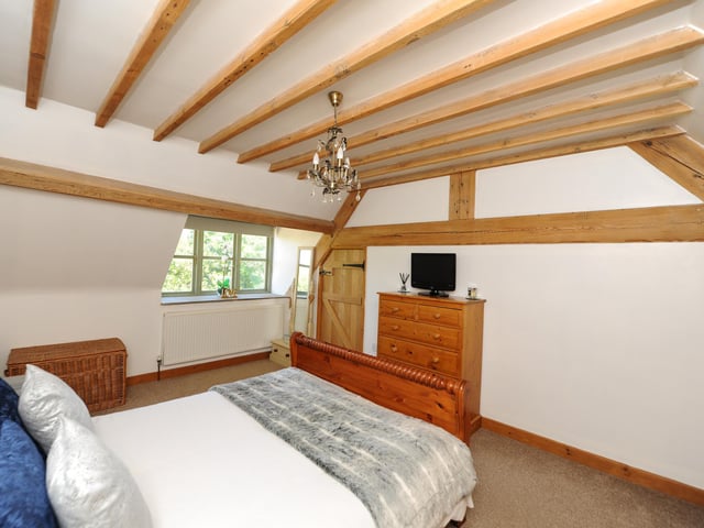 This good size room has fitted wardrobes.