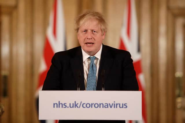 British Prime Minister Boris Johnson gives a press conference (Photo by Matt Dunham - WPA Pool/Getty Images)