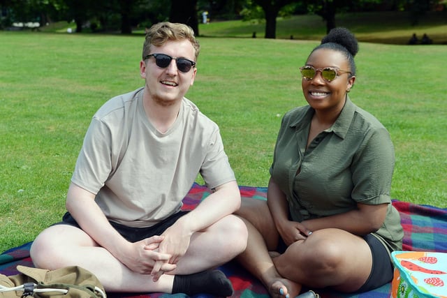 James Briggs and Kalifa Dinnalt enjoying a picnic in Weston Park.