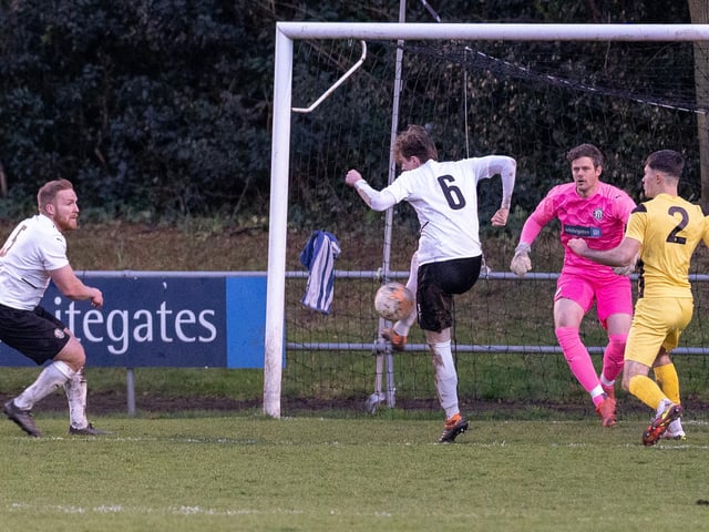 Action from Heanor Town v Selston at the Town Ground on Monday.