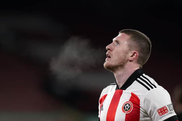 John Lundstram is out of contract at the end of the season, and appearently destined to leave Sheffield United: Andrew Yates/Sportimage