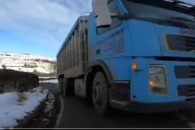 PIcture shows a lorry on the wrong side of the road in Bradfield, Sheffield, narrowly missing a cyclist. The driver has been banned from driving