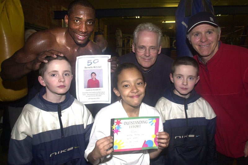 Pictured at Brendan's Newman Road boxing gym, Wincobank, Sheffield, Bernelle Mitchell is seen with an outstanding effort award that she received for her work at Brinsworth Manor School. Seen with her are fellow young fighters Joe and Danny Bagley, watched over by Johnny Nelson, David Jones from Sheffield University, and Brendan Ingle
