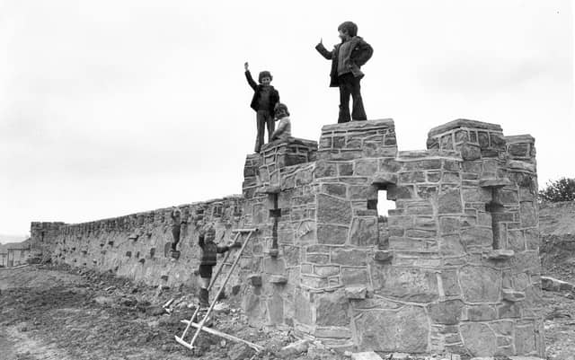 Children climb the walls of Mosborough Castle in 1973