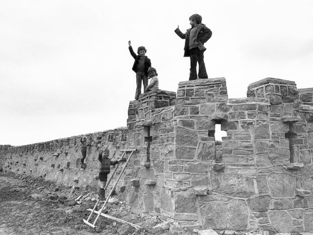 Children climb the walls of Mosborough Castle in 1973