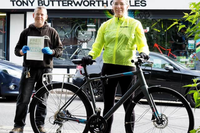 Rayna Foletti receives her new bike from David Nottage at Tony Butterworth Cycles