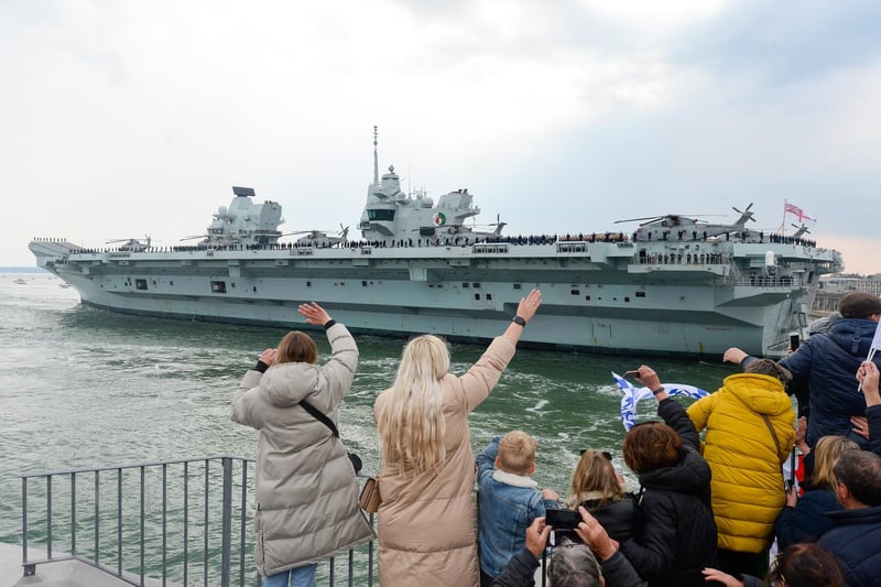 Crowds wave HMS Queen Elizabeth. Picture: Finnbarr Webster/Getty Images