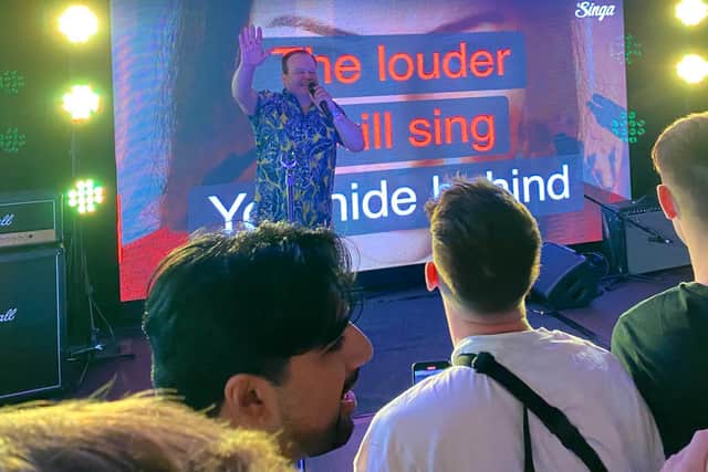 Shaun Williamson performs Something Inside So Strong during Barry-oke at The Open Arms at Tramlines 2021