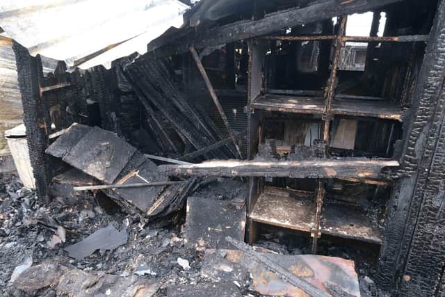 The aftermath of the latest fire to hit allotment buildings at Skye Edge fields in Sheffield, where around 350 pigeons living in lofts there have been burned alive in two separate blazes
