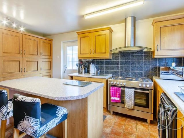 The impressive kitchen is the favourite room in the house of estate agents Buckley Brown. It comes complete with a range of wall and base units, plus a centre island.