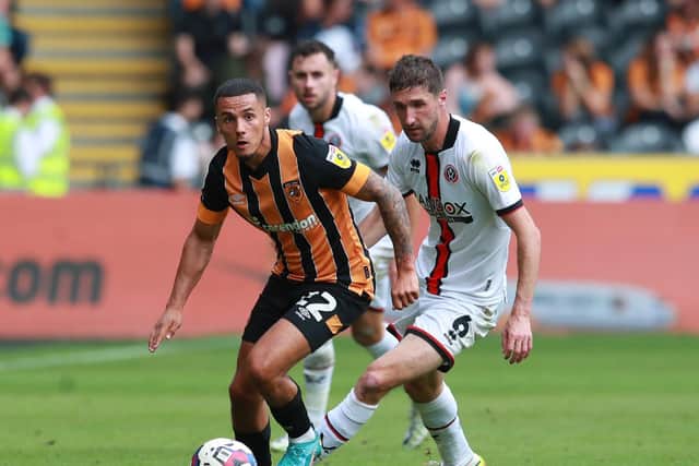 Chris Basham came on for Sheffield United during their win over Hull City: Simon Bellis / Sportimage