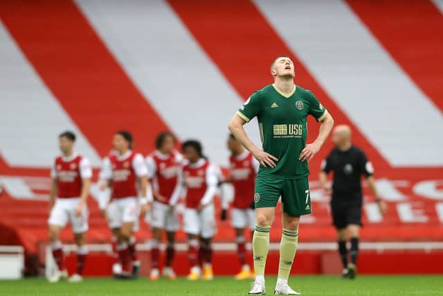Sheffield United's John Lundstram looks on dejected after Arsenal's second goal during the Premier League match at the Emirates Stadium, London.  David Klein/Sportimage