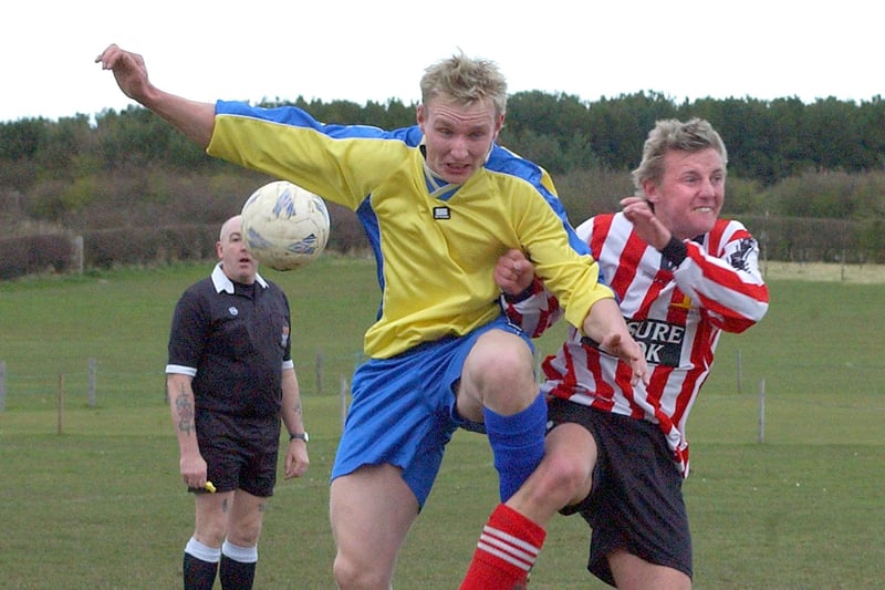 Action from a match between Amble United and Red Row, in March 2004.