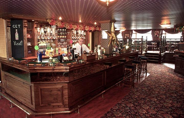 Pictured at the newly refurbished pub, The Royal Oak, Mansfield Road, Intake, where landlord Billy Margetts is seen at the bar, December 1997